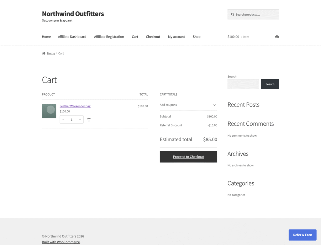Storefront cart on a WooCommerce store using Affiliate and Referral Program for WooCommerce, showing a Referral Discount line of minus $15 applied automatically to a referred shopper's $100 cart